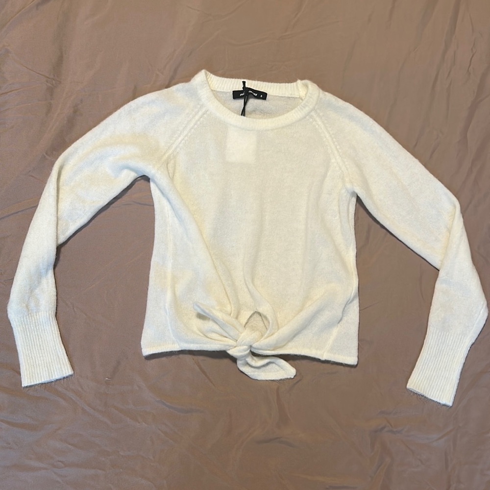 Cream-colored sweater by Olivaceous, size small.